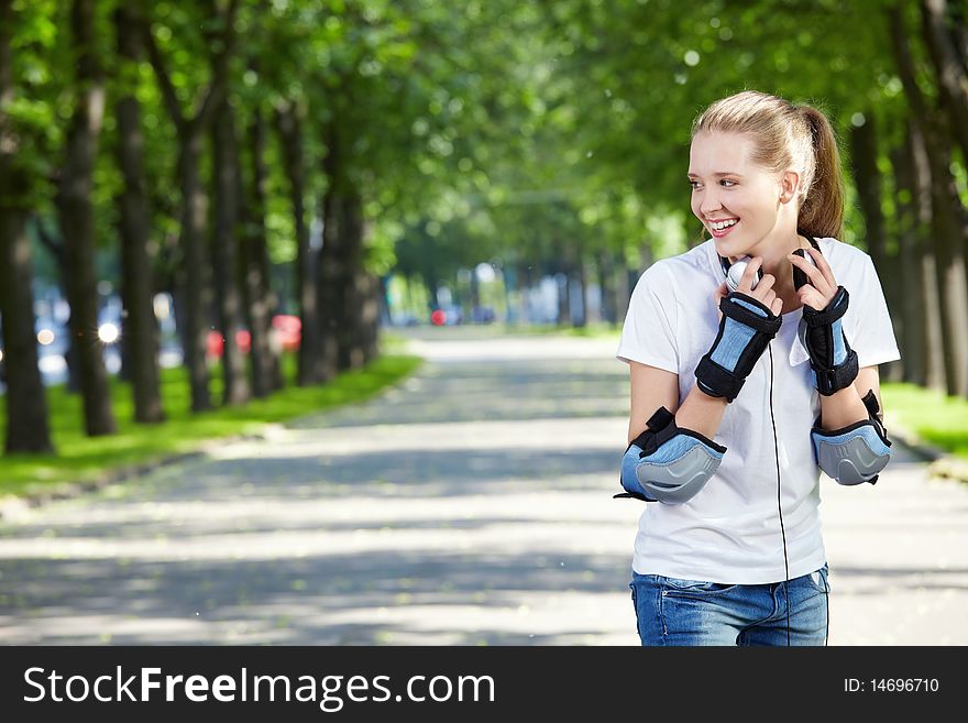 The attractive girl looks aside in park. The attractive girl looks aside in park