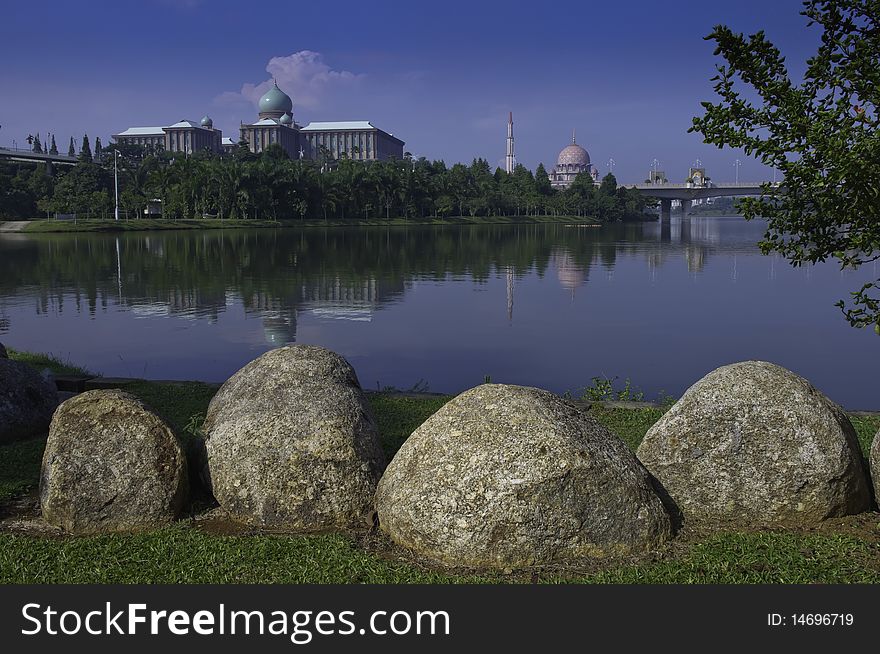 Rock boulders on the lakeside of capitol city of Putrajaya, Malaysia. Rock boulders on the lakeside of capitol city of Putrajaya, Malaysia