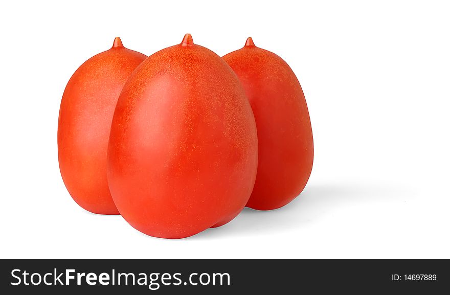 Three plum tomatoes over white background