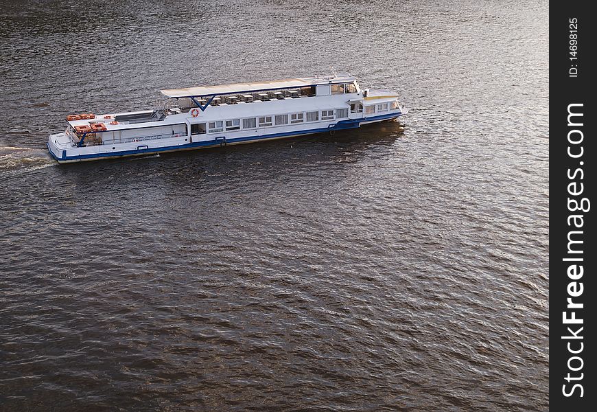 Pleasure boat on a river. Pleasure boat on a river