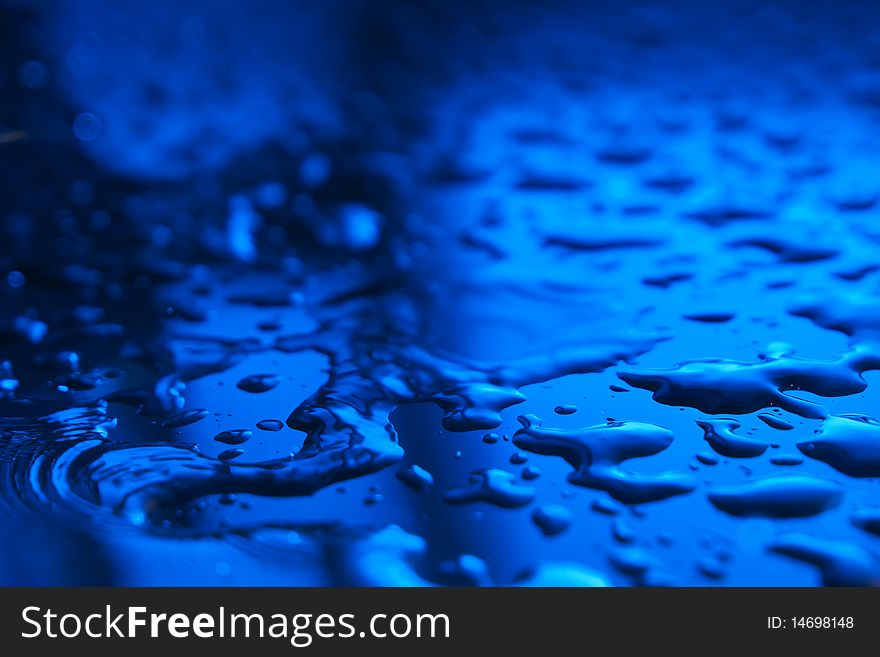 Abstract drops on surface in blue colors. Abstract drops on surface in blue colors