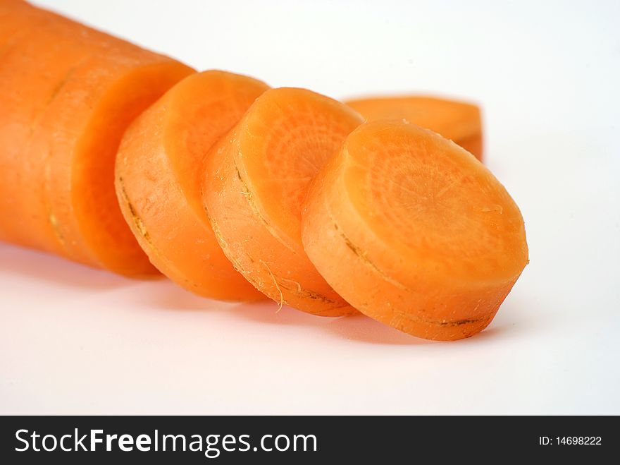 Sliced carrot on the white background. Sliced carrot on the white background