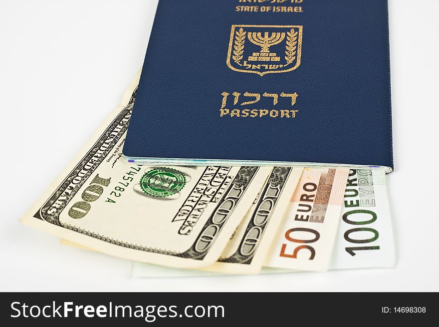 Israeli passport and dollar bills isolated on white with cliping path