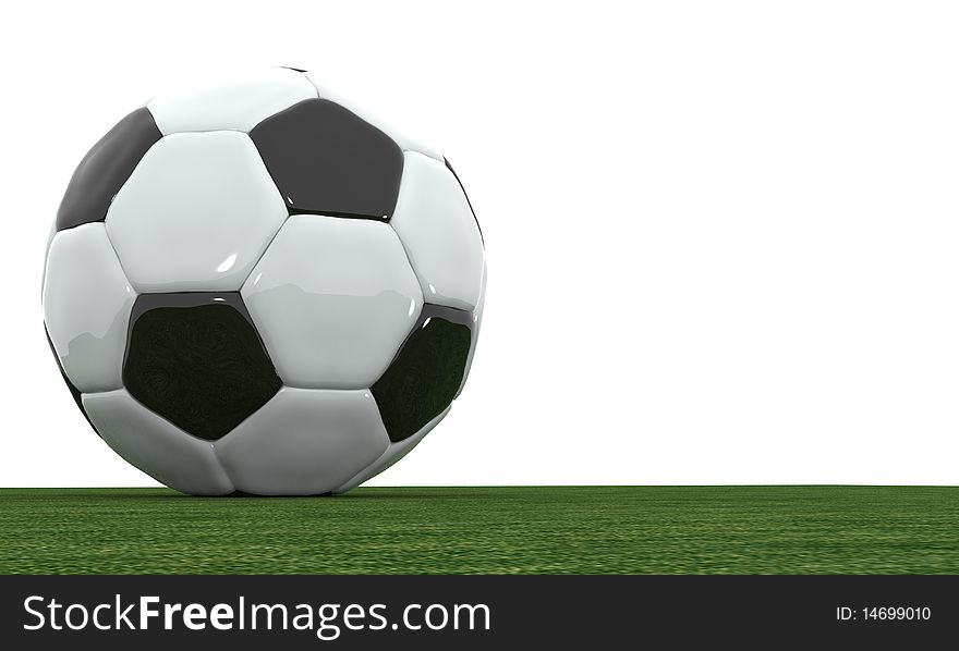 Football or soccer ball on the grass