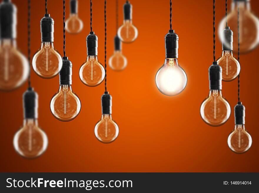 Idea And Leadership Concept Vintage Incandescent Edison Bulbs On Color Background