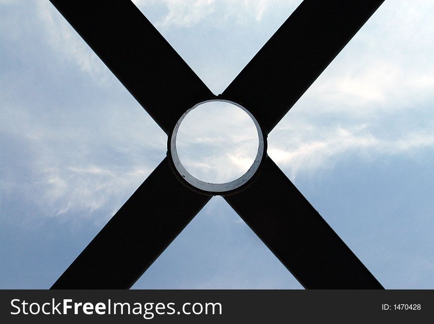 Structure beams on a bridge with sky in the background. Structure beams on a bridge with sky in the background