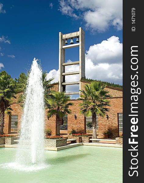 Modern Church Bell Tower and Fountain on a beautiful sunny day