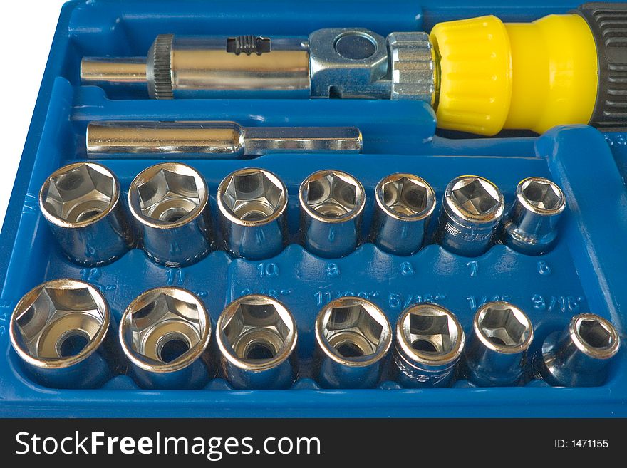 Screwdriver and screws on toolbox