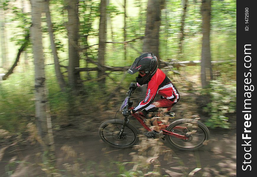 child Racing mountain bike zooming past 17. child Racing mountain bike zooming past 17