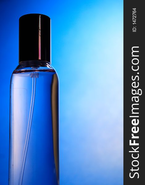 Long glass perfume with blue light