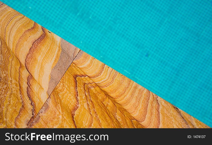 Water and the border of a swimming pool. Water and the border of a swimming pool