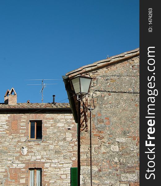 Old lamp and italian home in the tuscany
