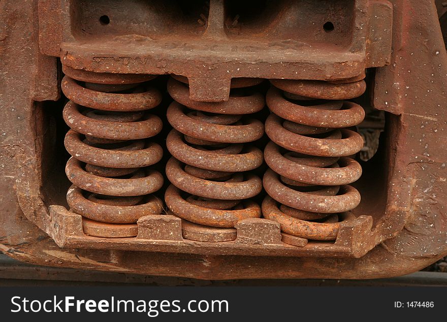 Rusty springs from a train locomotive. Rusty springs from a train locomotive