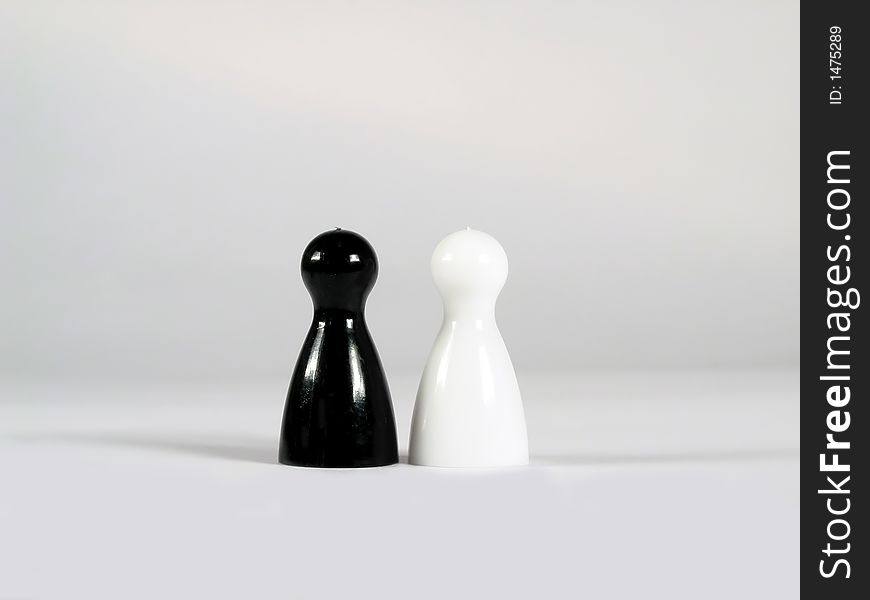 Black and white game pieces