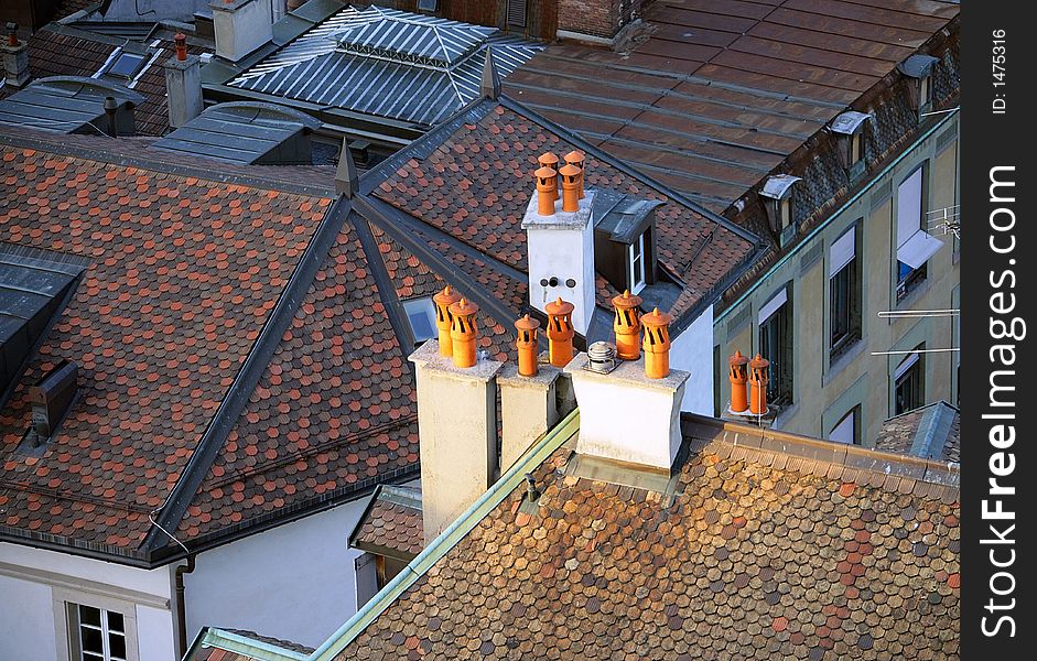 Roofs and Chimneys. View from above to Geneva. Roofs and Chimneys. View from above to Geneva