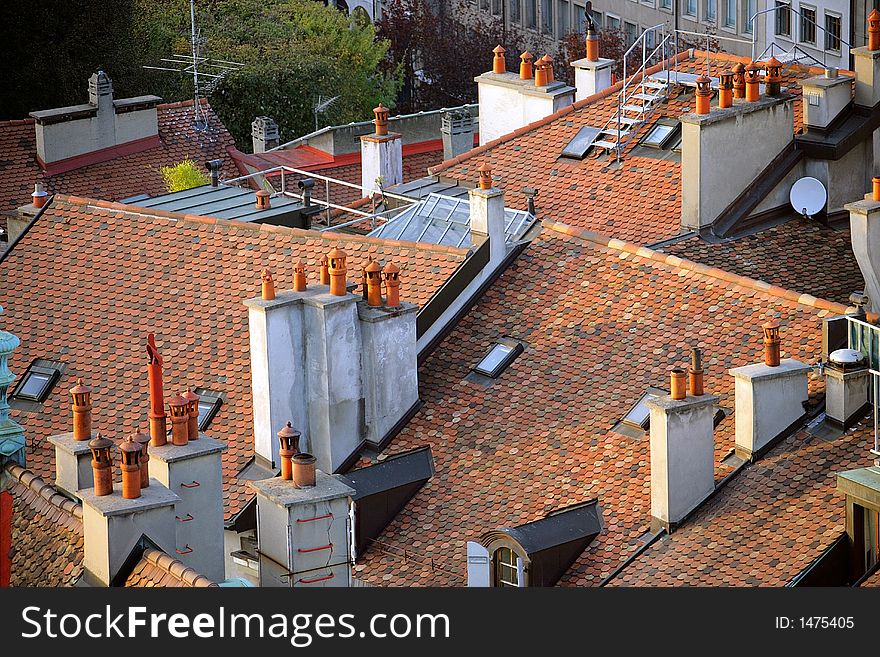 Roofs and Chimneys. View from above to Geneva. Roofs and Chimneys. View from above to Geneva