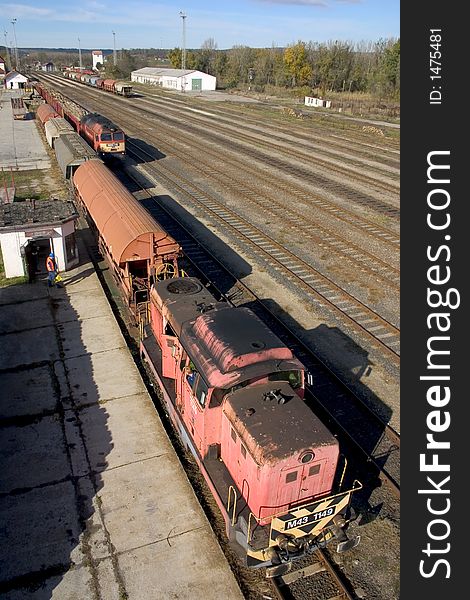 Freight trains in Bataszek, Hungary, transporting cereal and wood.