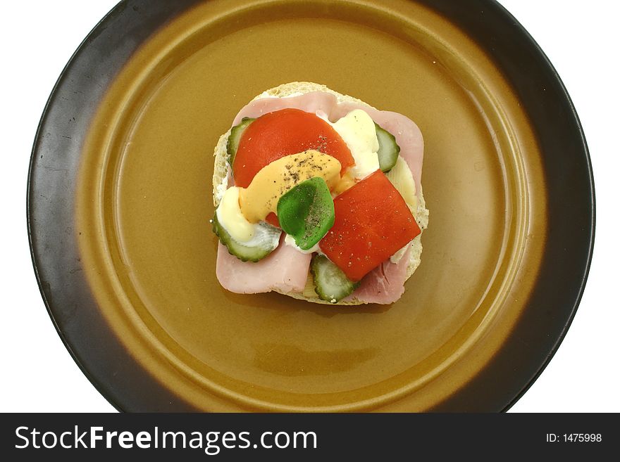 Colourful sandwich with mayonnaise on the plate