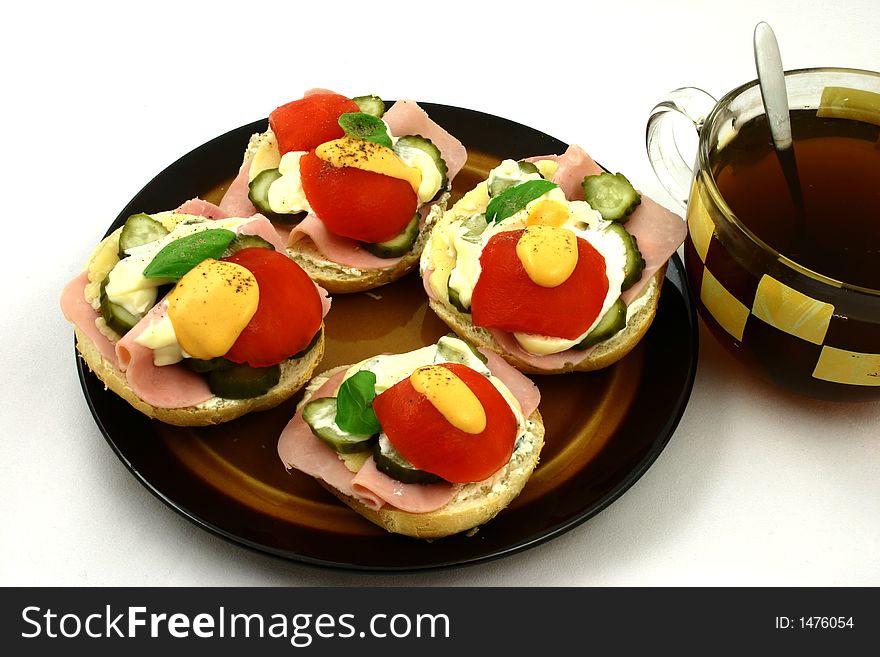 Four spring sandwiches with tea. Four spring sandwiches with tea