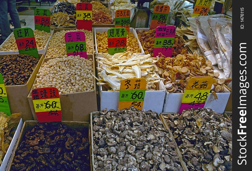 Typical goods such as dried fish and mushrooms in a Hongkong market outlet. Typical goods such as dried fish and mushrooms in a Hongkong market outlet