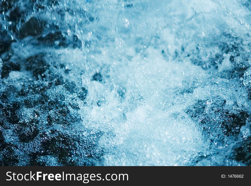 A blue splashing water background
