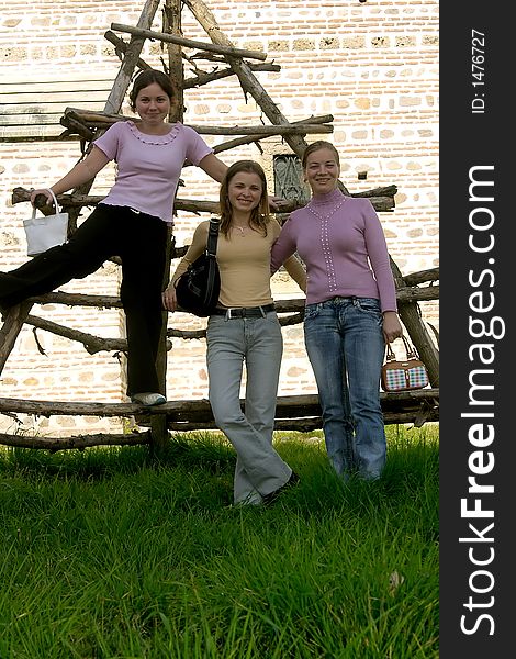 Three happy friends posing outdoor. Three happy friends posing outdoor