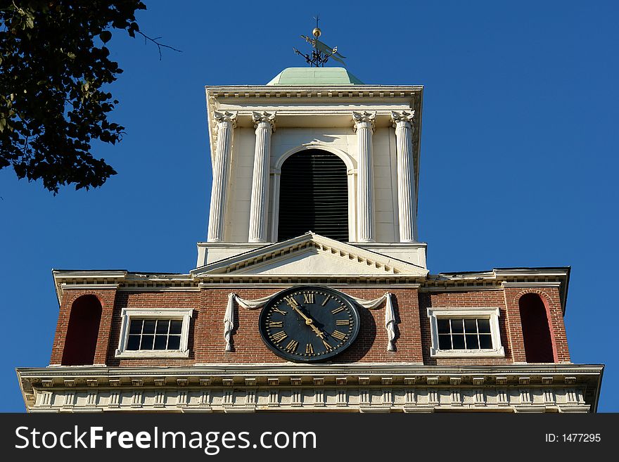 Red brick colonial church with white trim and closk tower and bell tower in boston. Red brick colonial church with white trim and closk tower and bell tower in boston