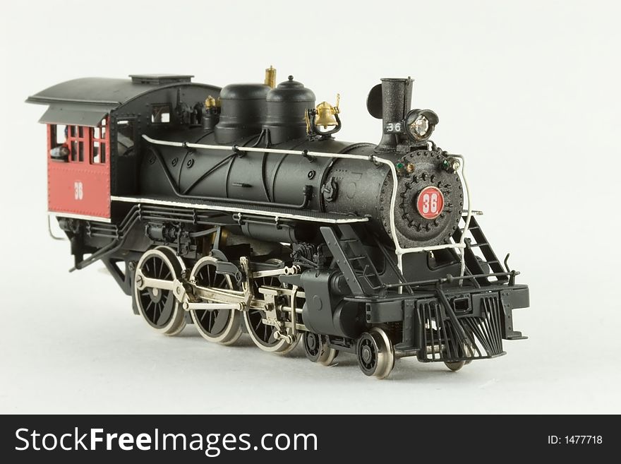 A black model steam locomotive. A black model steam locomotive