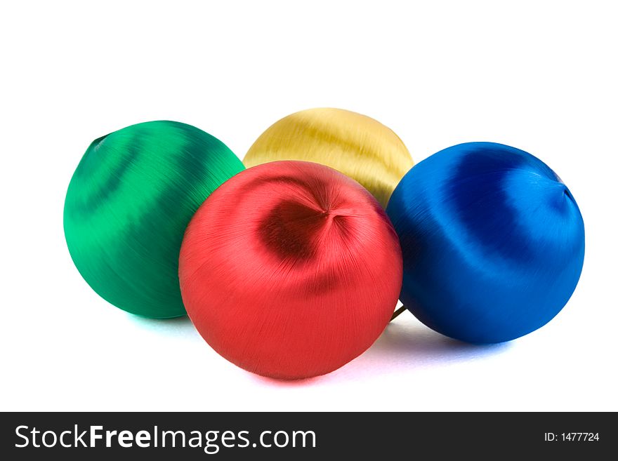 Four satin wrapped Christmas ornaments. Four satin wrapped Christmas ornaments