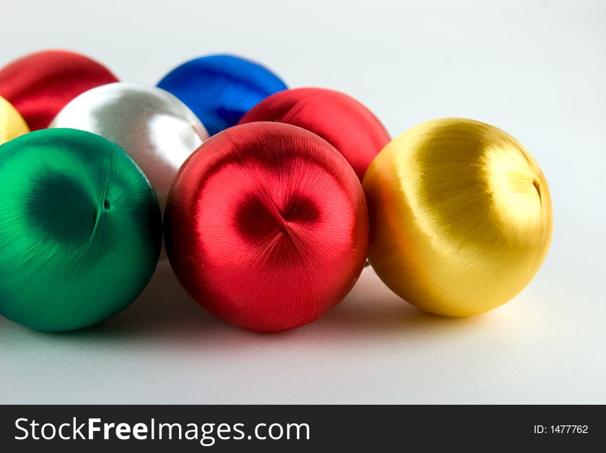 Colorful satin wrapped Christmas ornaments. Colorful satin wrapped Christmas ornaments