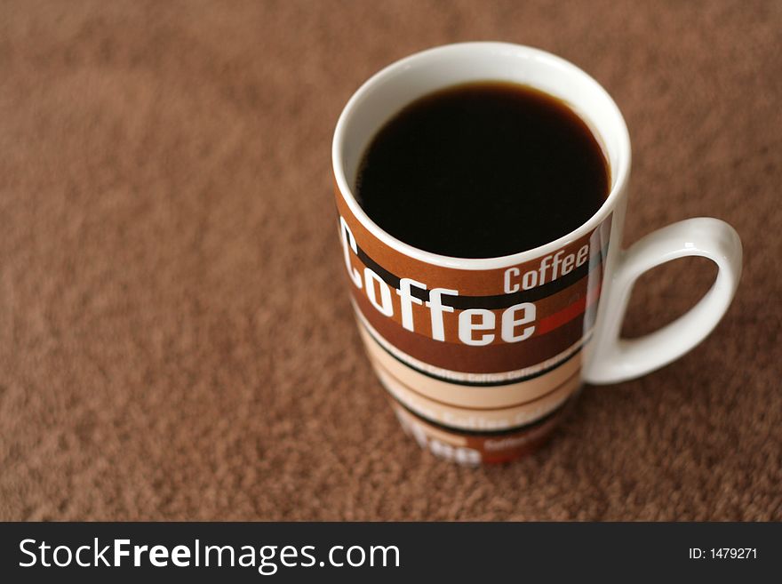 Picture of a brown coffee mug. Picture of a brown coffee mug