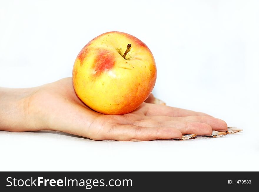 Hand red yellow apple fruit