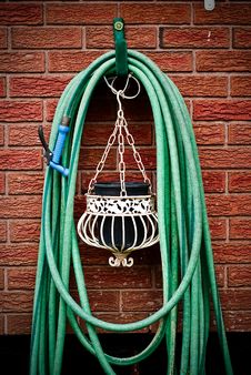 Coiled Garden Hose Hanging On Brick Wal Stock Images Coiled Garden Hose Hanging On Brick Wal Stock Images
