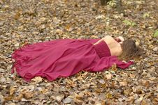 Girl In Red Dress Lying Stock Photos