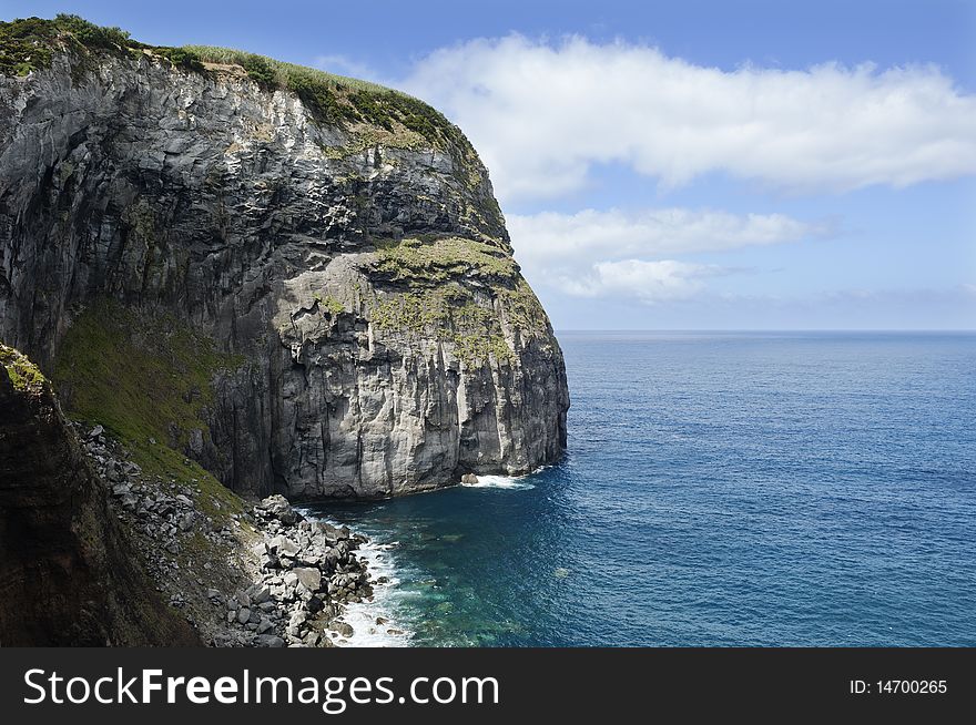 Volcanic geologic formation of Morro de Castelo Branco in Faial island, Azores, Portugal