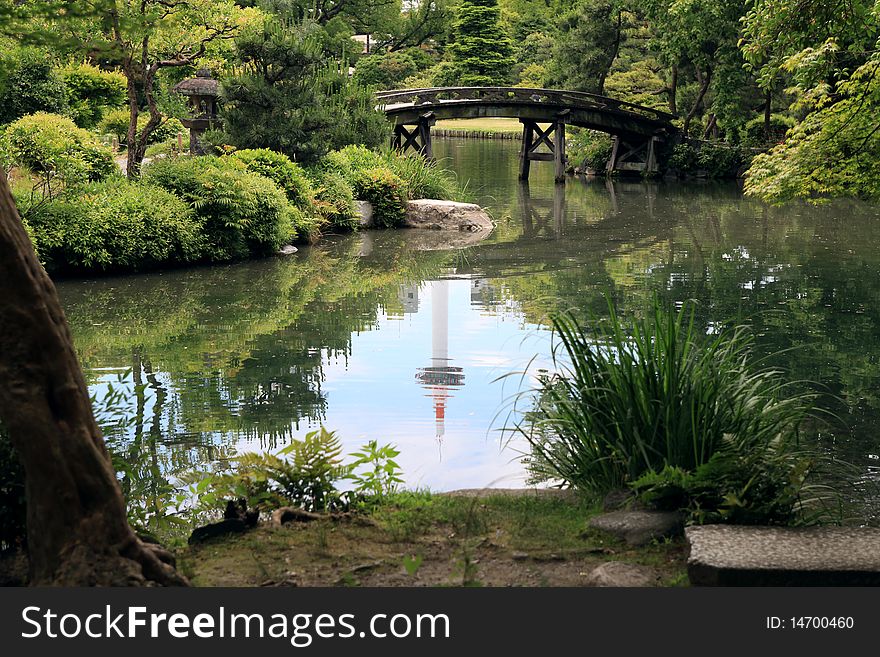 Modern tower reflected in the water