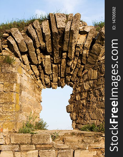 Loop-hole in the wall of the blasted defensive building from a stone. Loop-hole in the wall of the blasted defensive building from a stone