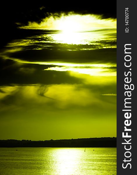 Photograph of the sunset over lake. Photograph of the sunset over lake