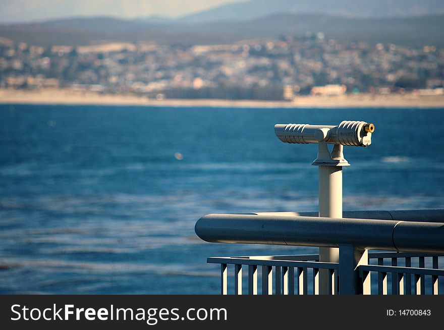 A telescope looks out over Monterey Bay in California. A telescope looks out over Monterey Bay in California.
