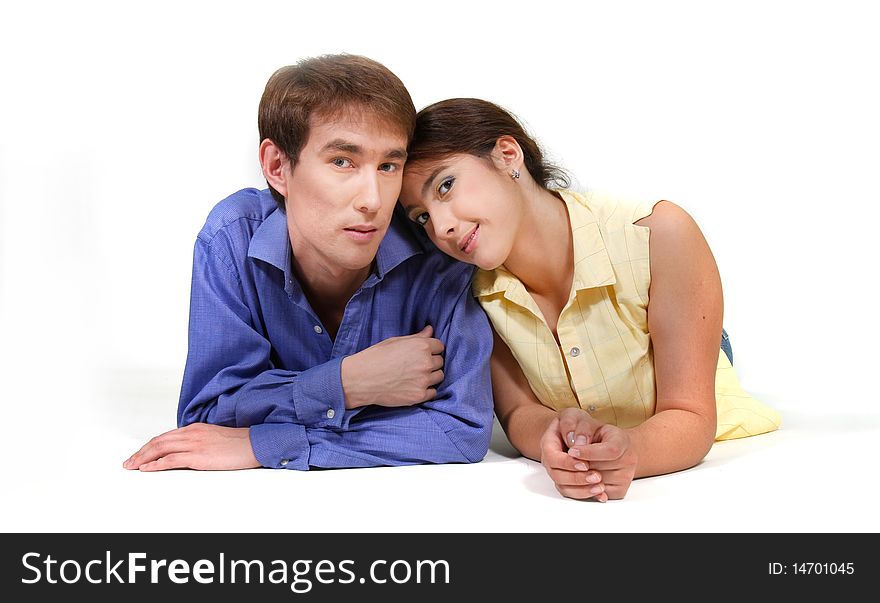 Young loving couple over white