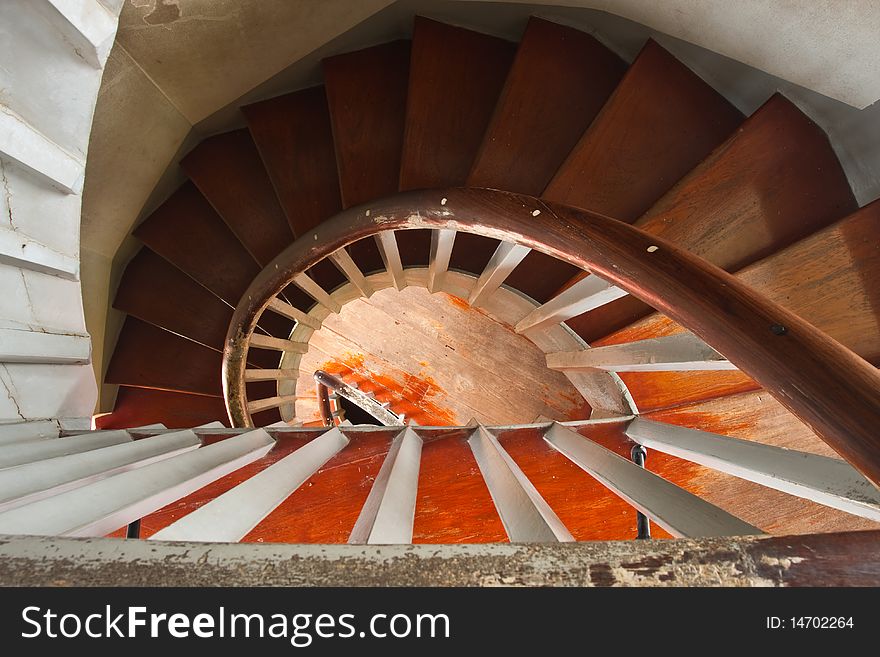 A wood spiral staircase