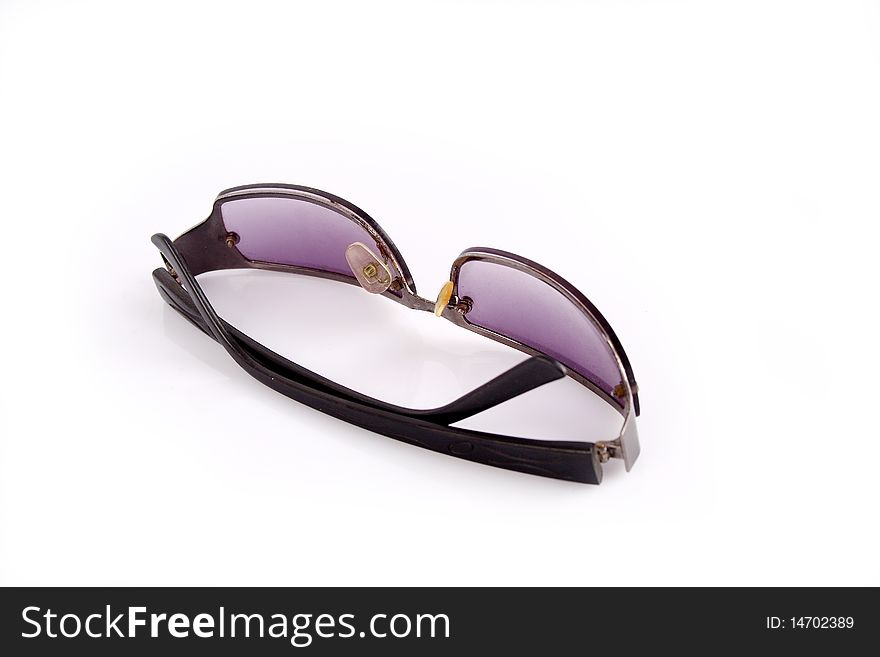 Modern sunglasses isolated on white