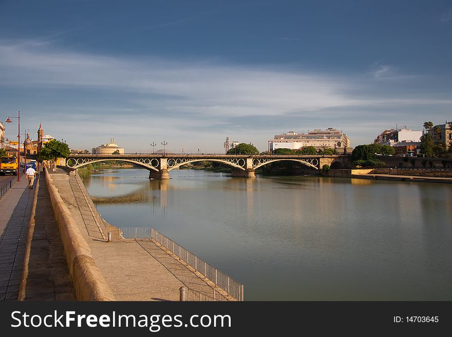 The bridge over the Guadalquivir river in Seville, Spain. The bridge over the Guadalquivir river in Seville, Spain