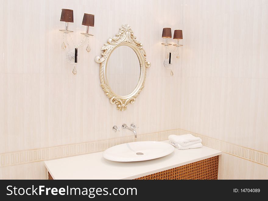 It is interior of apartment, it is a basin in the bathroom