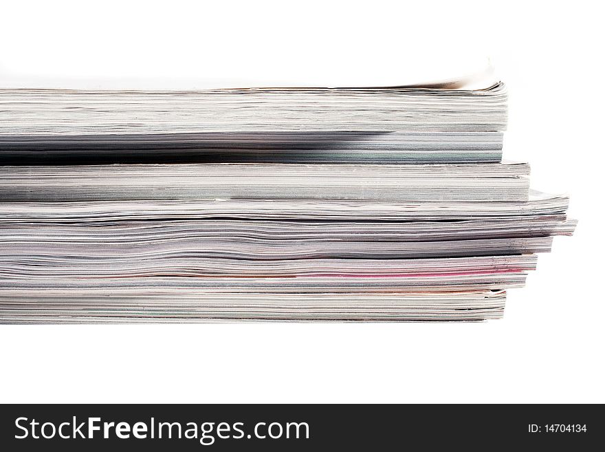 Stack of magazines isolated on a white