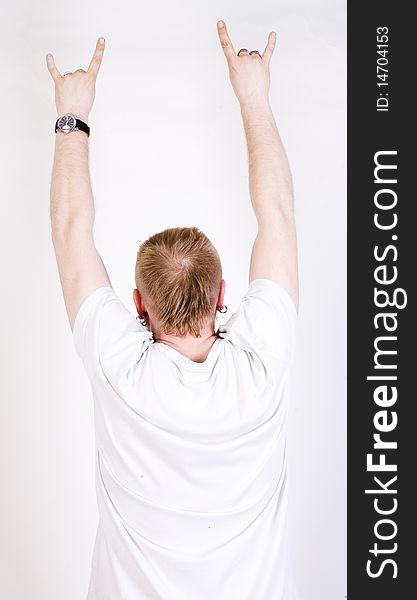 Man with raised hands isolated on a white