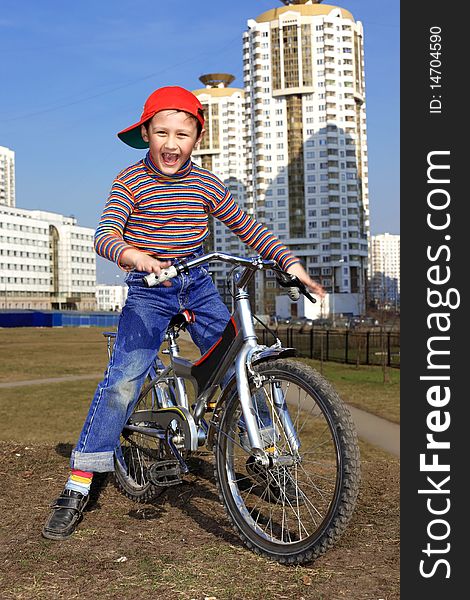 Boy Riding in Bicycle