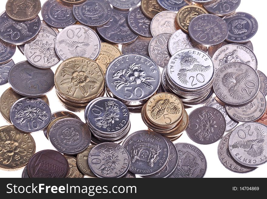 A grounp of singapore coins stack together. A grounp of singapore coins stack together