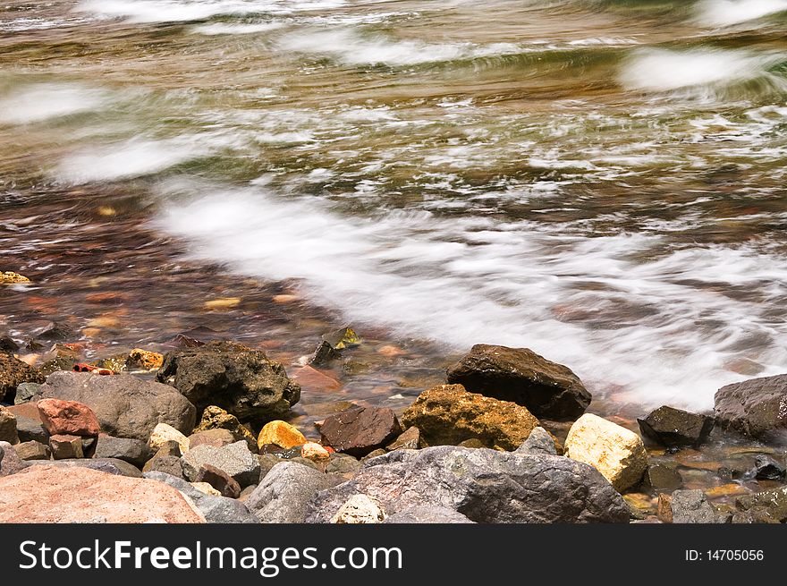 Sea-wave And Stones At The Coastline.