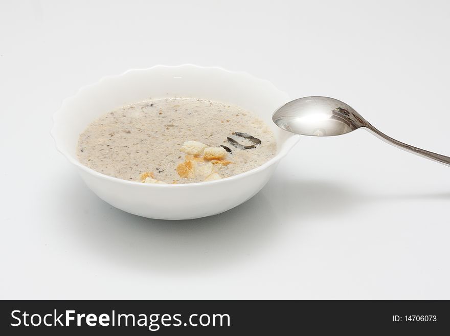 Homemade creamy mushrooms soup with thyme